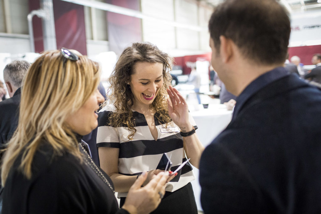 The Mark Andy team speaking with a possible new hire candidate.