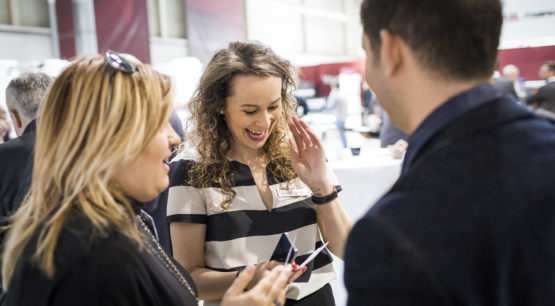 The Mark Andy team speaking with a possible new hire candidate.